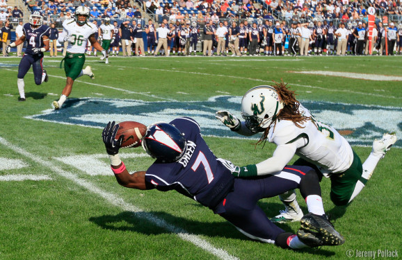 UConn's John Green (7-WR) nearly pulled in this 4th quarter catch when the game was tied up 10-10. Brandon Salinas (31-DB) of USF on the coverage was able to disrupt the play that Green couldn't quite hold onto the long throw at the USF 20. 